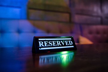 Table reservation sign close up. Ready for a party