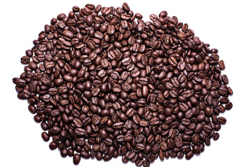 Pile of coffee beans on a white background