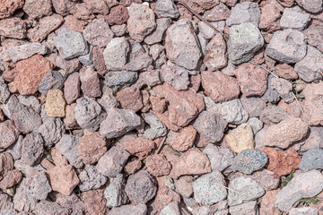 abstract background of pebbles along the road in the park