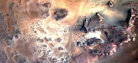 after bombs,  abstract photography of the deserts of Africa from the air. aerial view of desert...