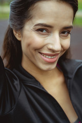 Portrait of cute woman that posing on camera