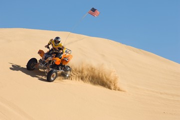 Man Riding Quad Bike In Desert © MDBPIXS