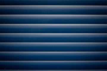 Obraz premium Dark blue metal garage door