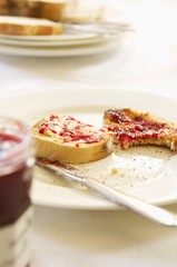 Closeup Of Half Eaten Toast With Jam