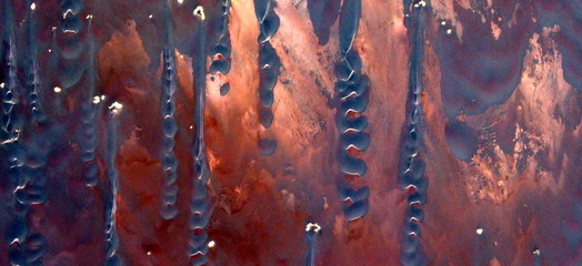 solid fire,  abstract photography of the deserts of Africa from the air. aerial view of desert...