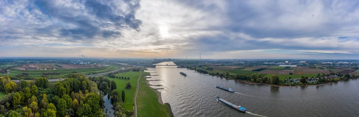 Foto op Plexiglas Panoramic view on riverboats on the Rhine. Aerial photography by drone. © Bernhard