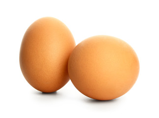 Fresh eggs on white background