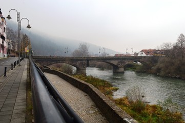 Fototapeta na wymiar autumn river and bridge landscape