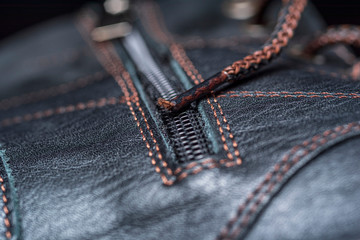 Fragment of a male leather shoe close-up.
