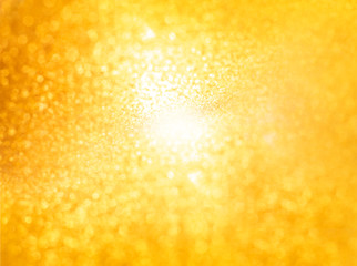 Abstract golden background. Sun glare. Bokeh