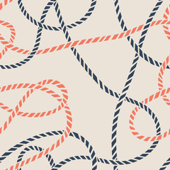 Fototapeta premium Seamless marine rope knot pattern. Endless illustration with color rope ornament and nautical sea knots. Trendy maritime style background. Rope texture. For textile, fabric prints, wrapping.