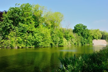 View of Green Park (Groenpark) and Majoorgracht canal in central Ypres (Ieper), Belgium