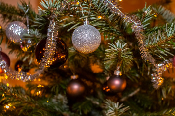 atmospheric, colorful Christmas decoration with fairy lights and shiny Christmas balls