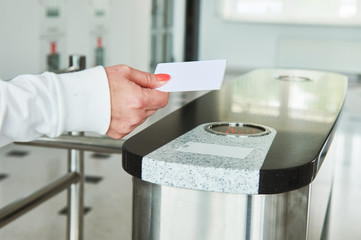 using electronic card key for access through turnstile