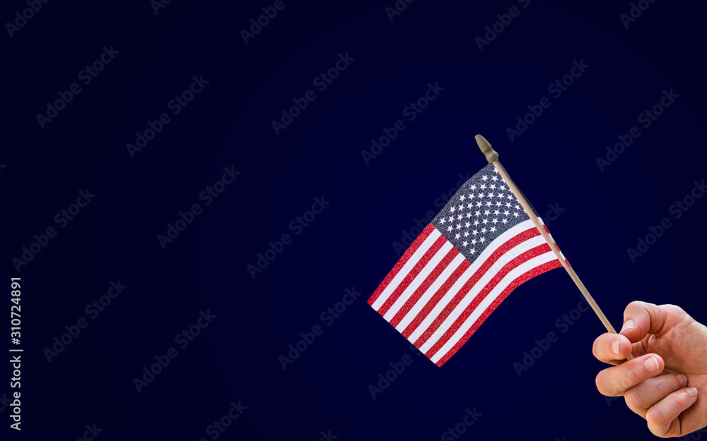 Wall mural american flag on dark blue background