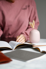 business background. notebooks white and grey. notebook in a cage on beautiful backgrounds. Close-up with blurred background.