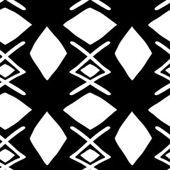 Fototapeta premium African seamless pattern with bogolanfini symbols. Ethnic wallpaper for cover design.