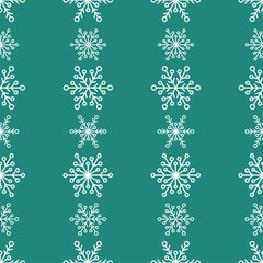 Winter seamless pattern with white snowflakes on blue background.