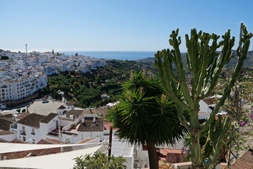 View on the beautiful houses of Frigiliana, a "white village / pueblo blanco" and on the beautiful coast at the Costa del Sol near Málaga, Spain, Europe