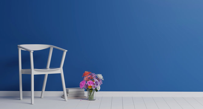 white chair with colorful flower in classic blue color living room. Minimal style concept. pastel color style.