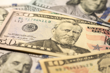 Close up of different dollar bills as background. Amarican dollars pattern. Top view of business concept.