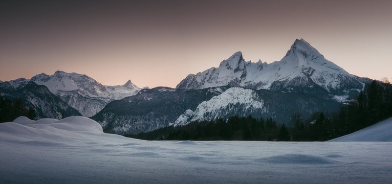 Fantastic evening and morning winter landscape. Colorful overcast sky. Beauty world Magical snow covered tree. Dramatic wintry scene. 