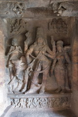 Fototapeta na wymiar Cave 1 : Shiva , Parvati and Nandi bull sculpture. Badami Caves, Bijapur district, Karnataka, India.