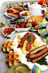 Breakfast served with coffee, orange juice, croissants, cereals and fruits. Balanced diet. Continental breakfast on carnival or new year