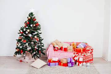 Christmas tree gifts new year white room with sofa