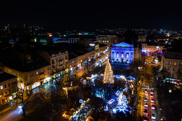Opening of Christmas tree near Opera House in Lviv, Ukraine. View from drone