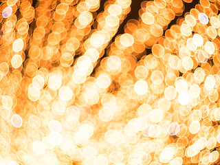Illuminated lights beautiful bokeh. Festive background. Bright Christmas Street Illumination. The City is Decorated for the Christmastide Holiday. New Year Lights Decorating Shimmering bokeh. Bright