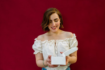 girl opening a gift