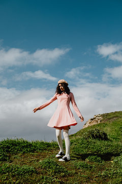 Girl twirling in nature