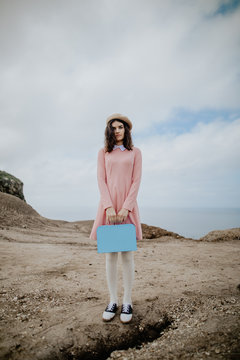 Cute girl standing in dirt