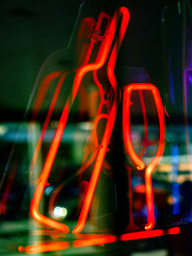 Neon sign in the form of a bottle and a glass