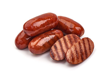 Grilled pork sausages, isolated on white background