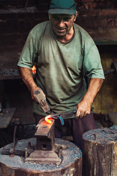 Man Working In The Blacksmith