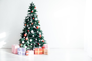 Christmas home decor with Christmas tree and gifts for the new year