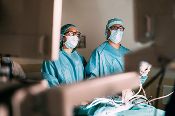 Professional medical team performing surgery at the hospital