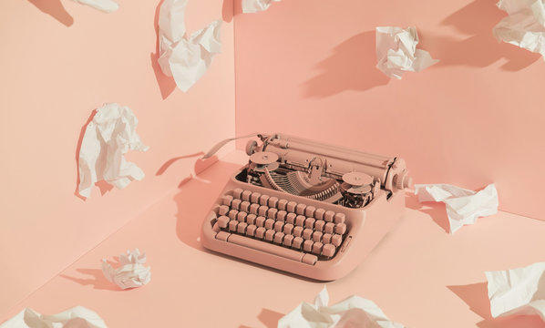 Pink Office Typewriter With White Paper