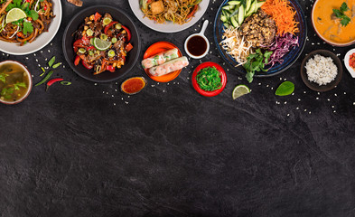 Asian food background with various ingredients on rustic stone background , top view. Vietnam or Thai cuisine.