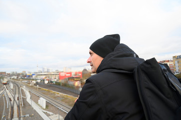 Man looking at something. Winter time. Berlin (Germany)