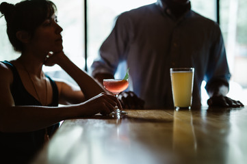 Woman and Man on a date, she is looking upset