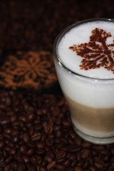 Christmas cappuccino with cinnamon and coffee beans
