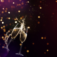 Glasses of champagne levitating in the air, celebration theme. © Lukas Gojda