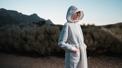 Female Model Wearing White Coat In The Nature