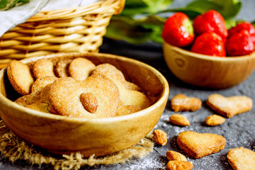 Almond flour cookies. A healthy homemade sugar-free cookie made from almond flour and coconut oil. Proper nutrition, keto baking, sugar-free cookies.Cookies heart with almonds