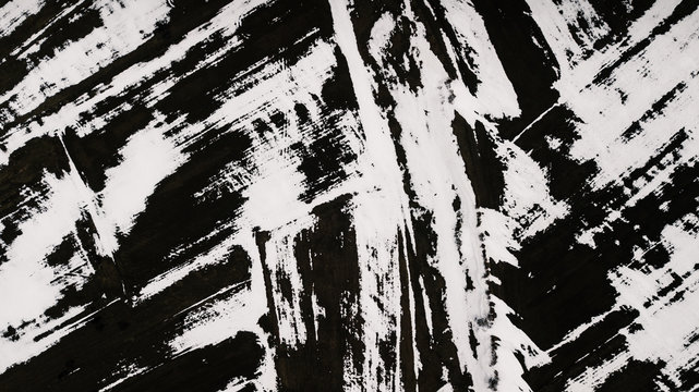 Armenian Spring - abstract drone shot of a field with snow blown out by the wind