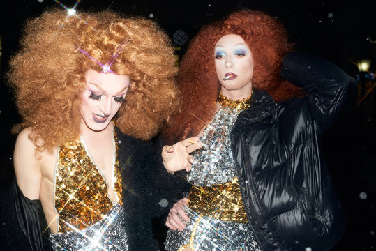 Two Drag Queens Posing With Cigarettes