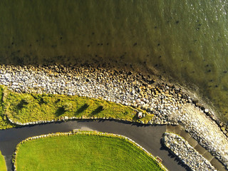 Walking path by seashore, Aerial view, Sunny day, Landscape.